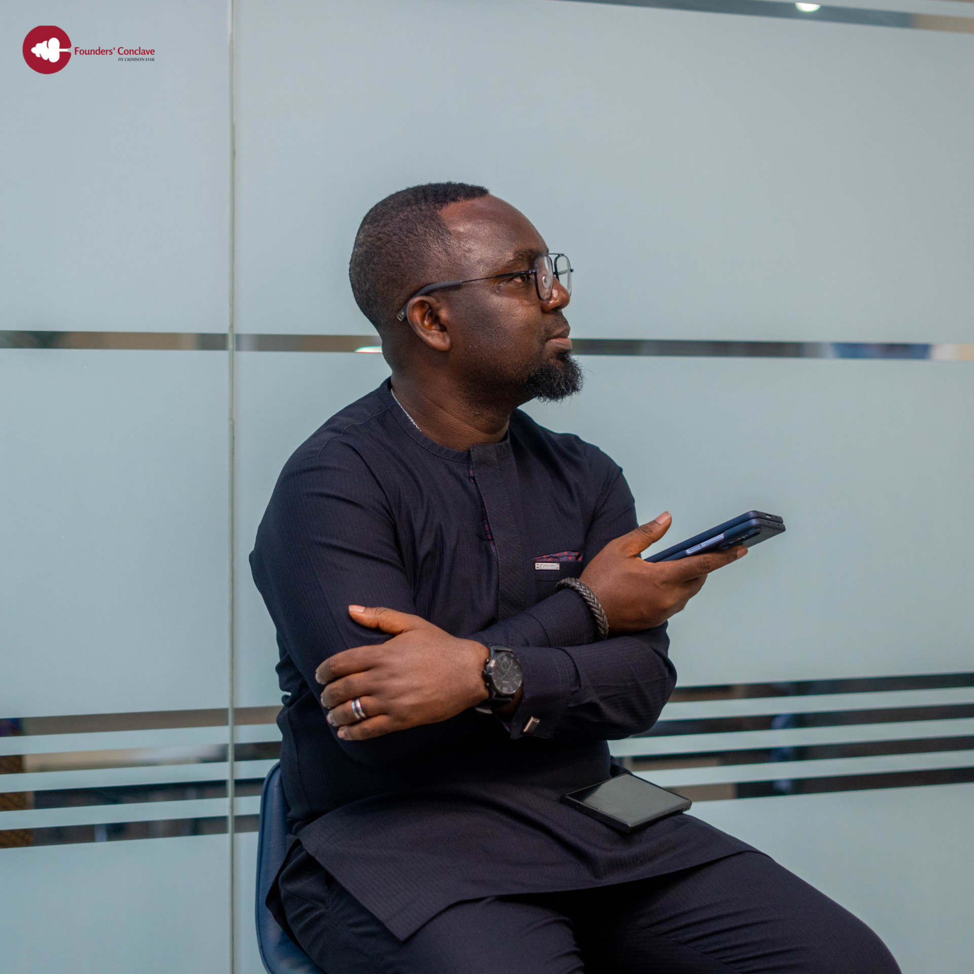 A partner listening during a Founders' Conclave session